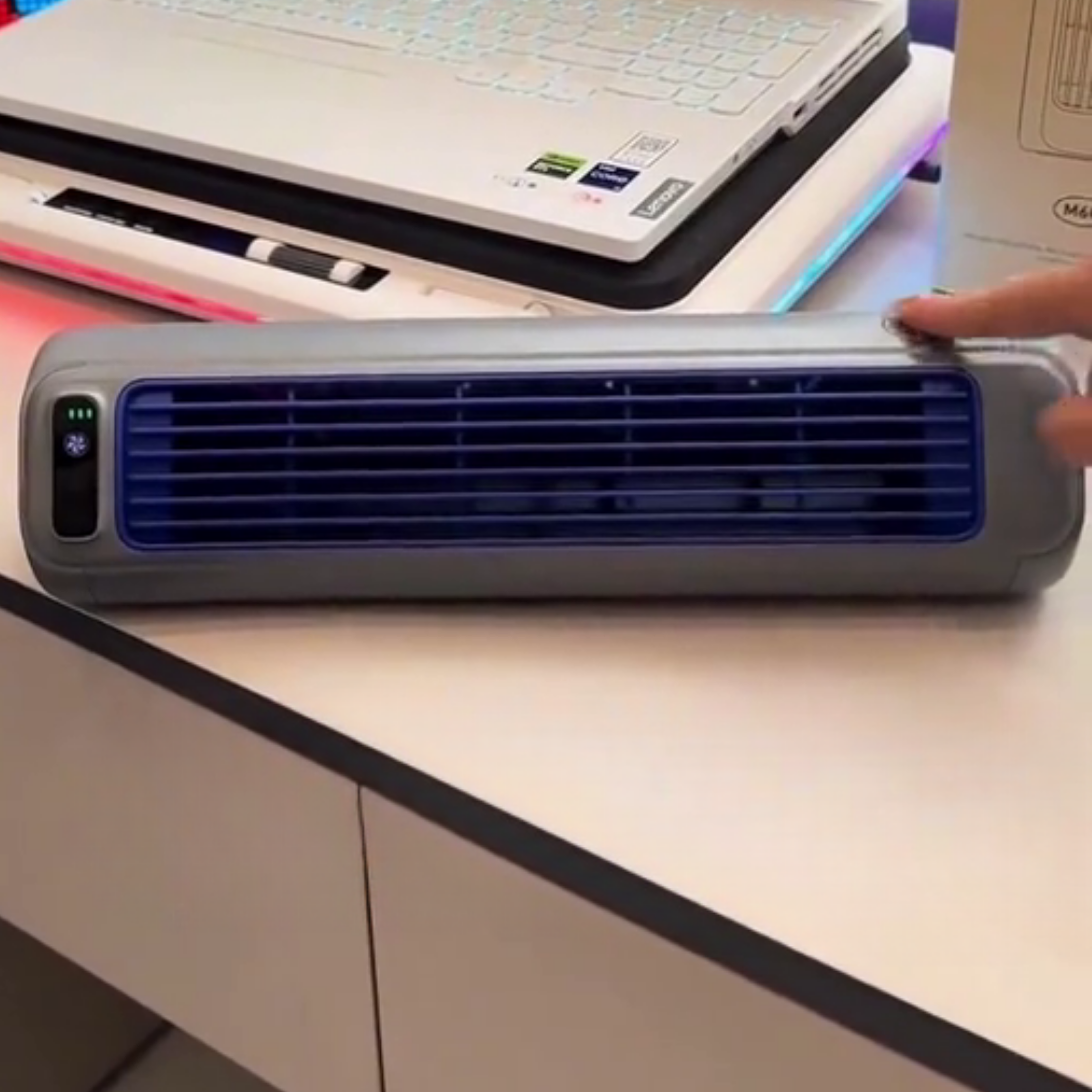 Katie C. using Vital Cooling Breeze at her desk